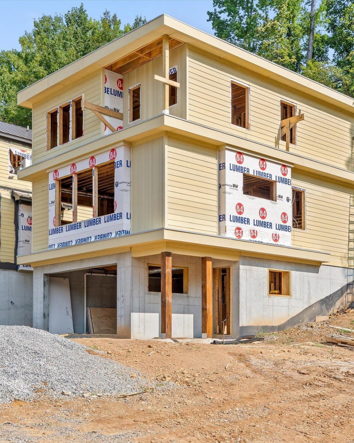 One of the first residences under construction, framed and partially sided