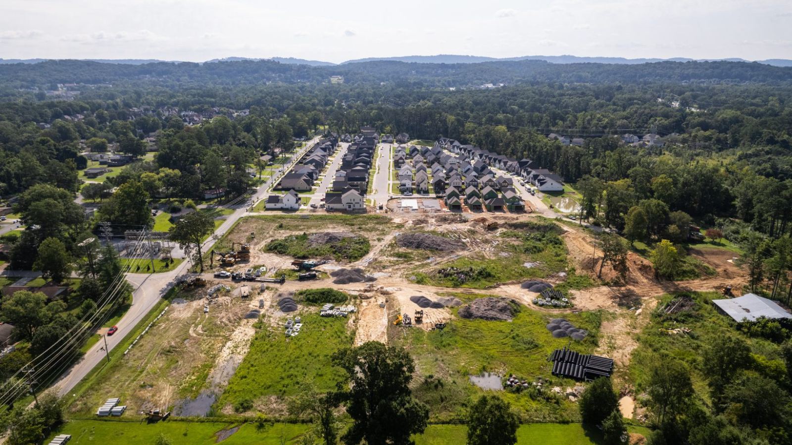 Aerial view of the Phase 2A site with the finished Phase 1 streets beyond