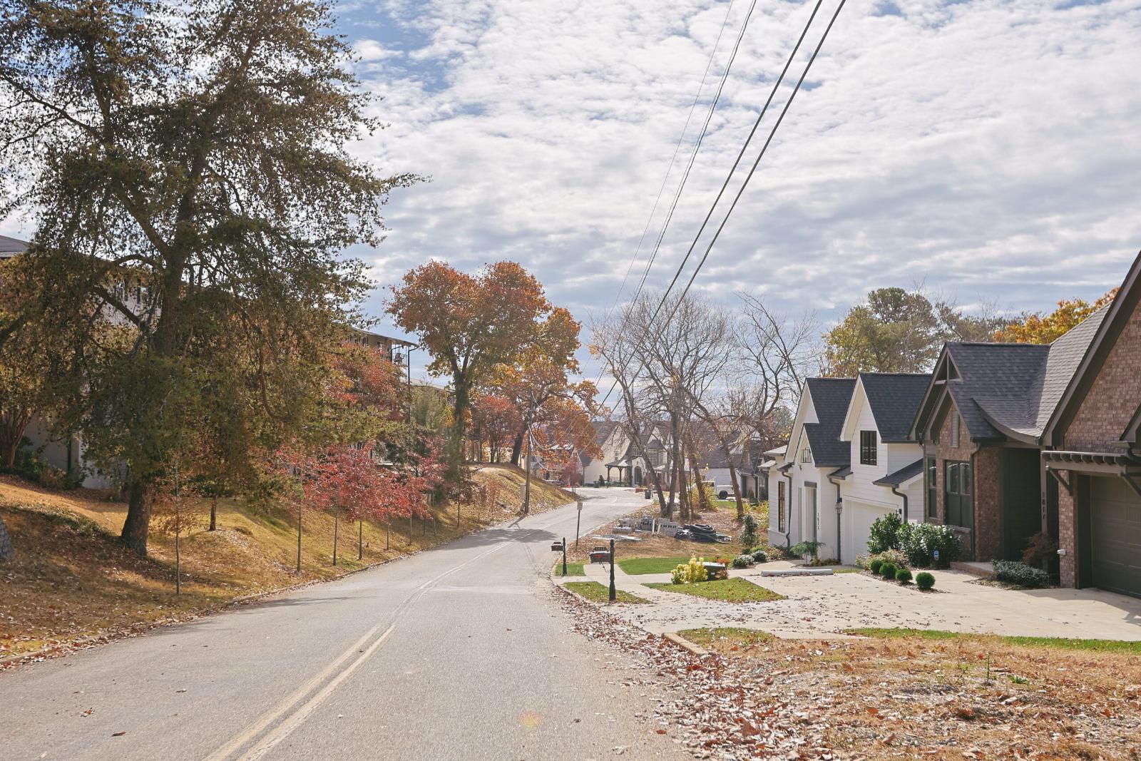 Homes under construction along the neighborhood road